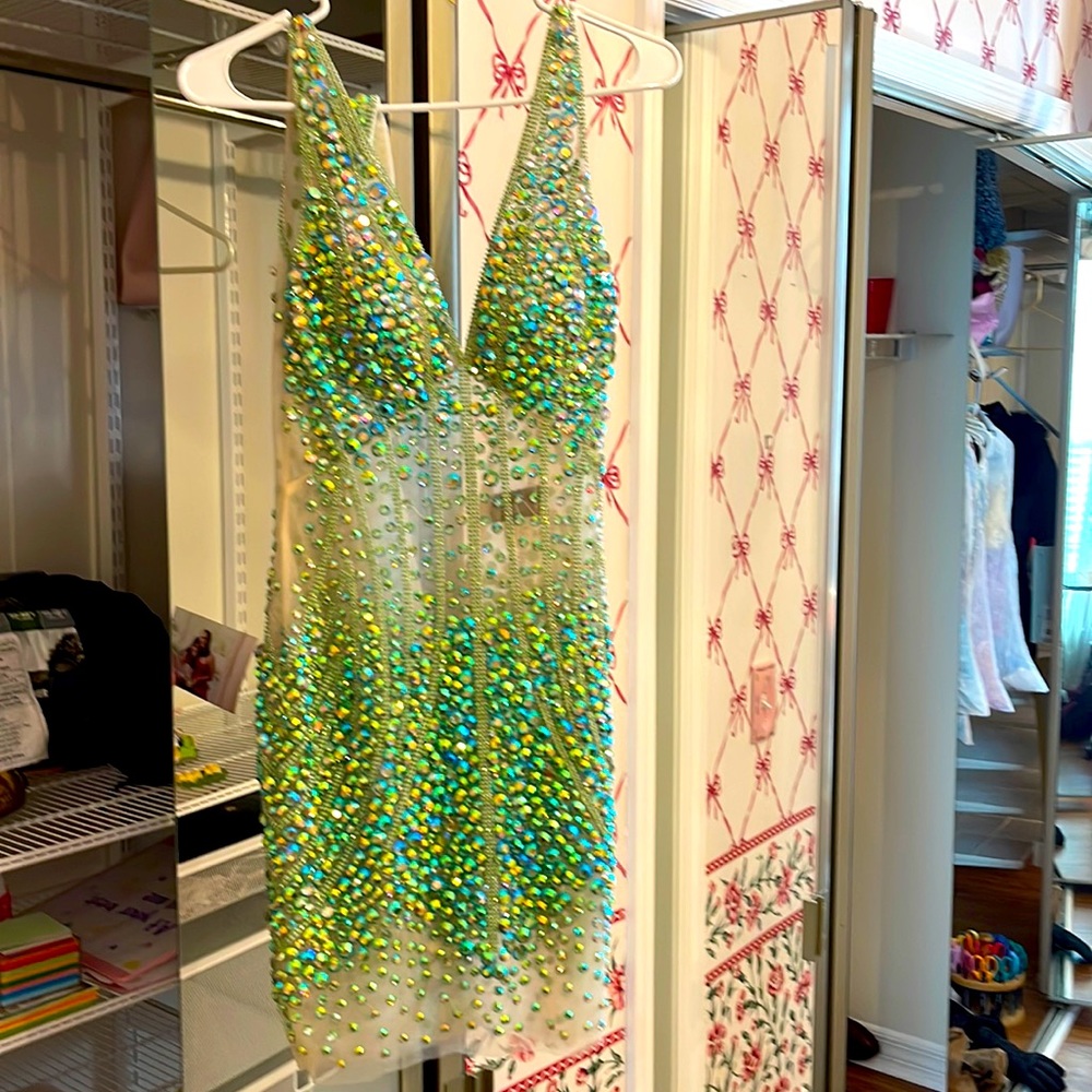 Special occasion blue/green rhinestone dress.  Worn once. Like new condition.